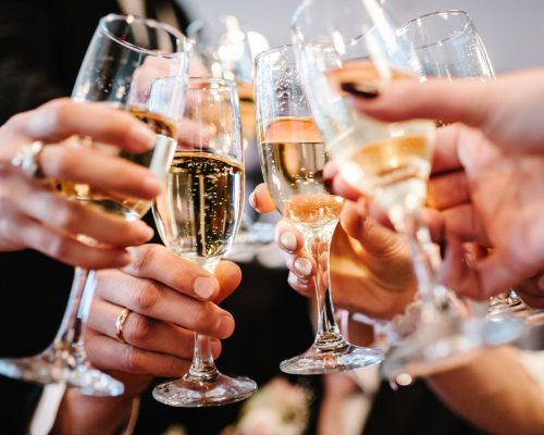 Cheers!,People,Celebrate,And,Raise,Glasses,Of,Wine,For,Toast.